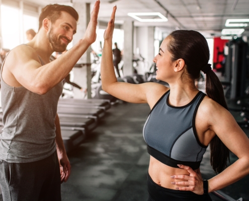 Couples fitness training Westport CT session at Sherpa Fitness with partners celebrating workout goals