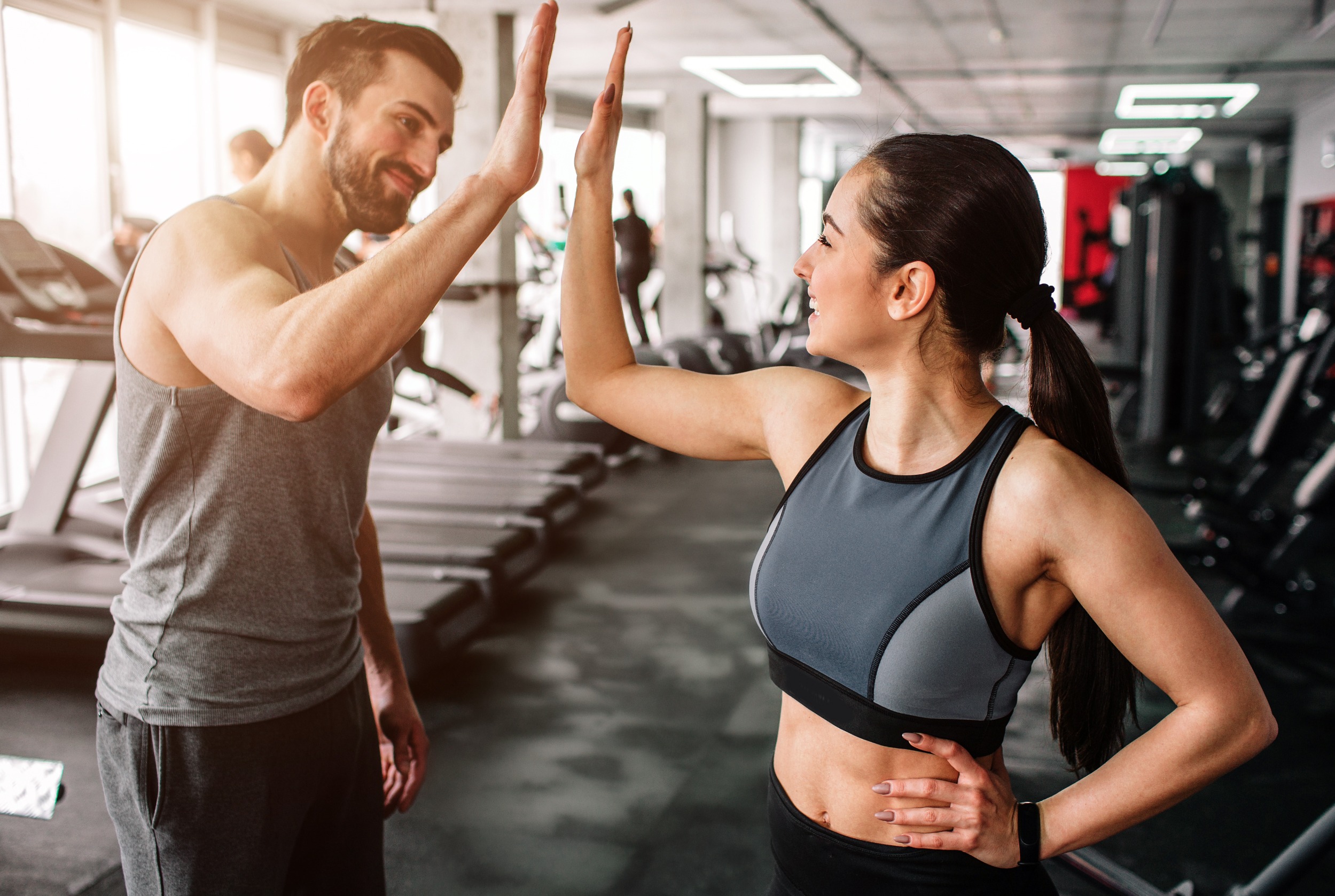 Couples fitness training Westport CT session at Sherpa Fitness with partners celebrating workout goals