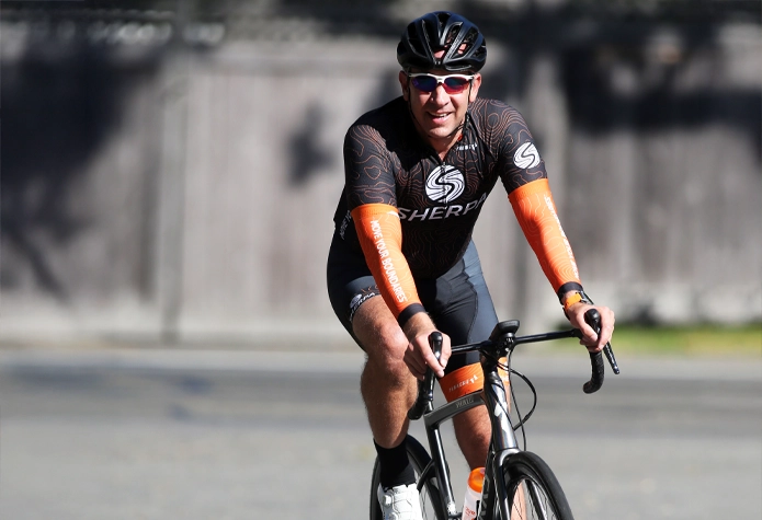 Sherpa trainer Tor providing endurance coaching in Westport CT with treadmill and bike trainer.