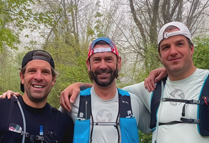 Rocky Prograno leading a group hike with RIPROUR, combining fitness and outdoor exploration for leadership and resilience training.