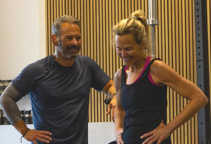 Couple training together in semi-private personal training session with certified Sherpa fitness coach in Westport CT