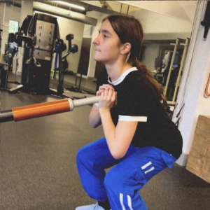 Kid building strength with age-appropriate lifting at Sherpa Basecamp in Westport, CT